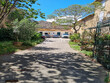 Ensemble-immobilier-avec-maison-dhabitation-et-cave-particulie